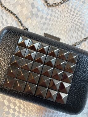 Black Studded Metal Accent Crossbody Clutch/Purse. 
Solid and Sturdy.
Brand New